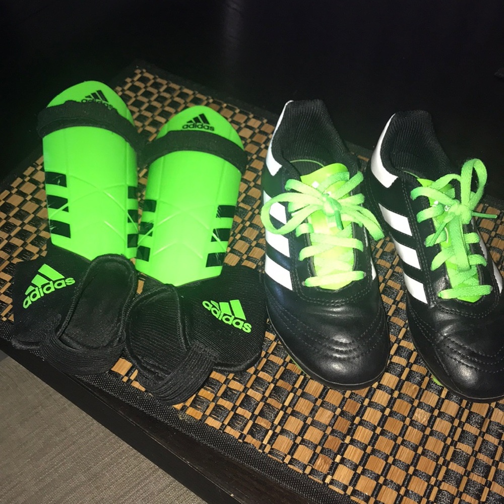 Little boy cleats / shin guards